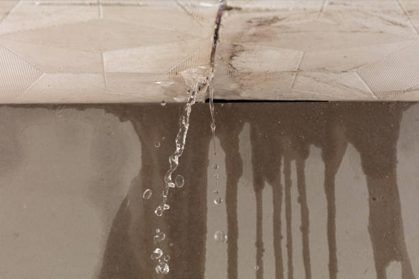 Professional Flood Damage Cleanup technician working in Fair Haven, NY